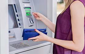 Image of women using ATM
